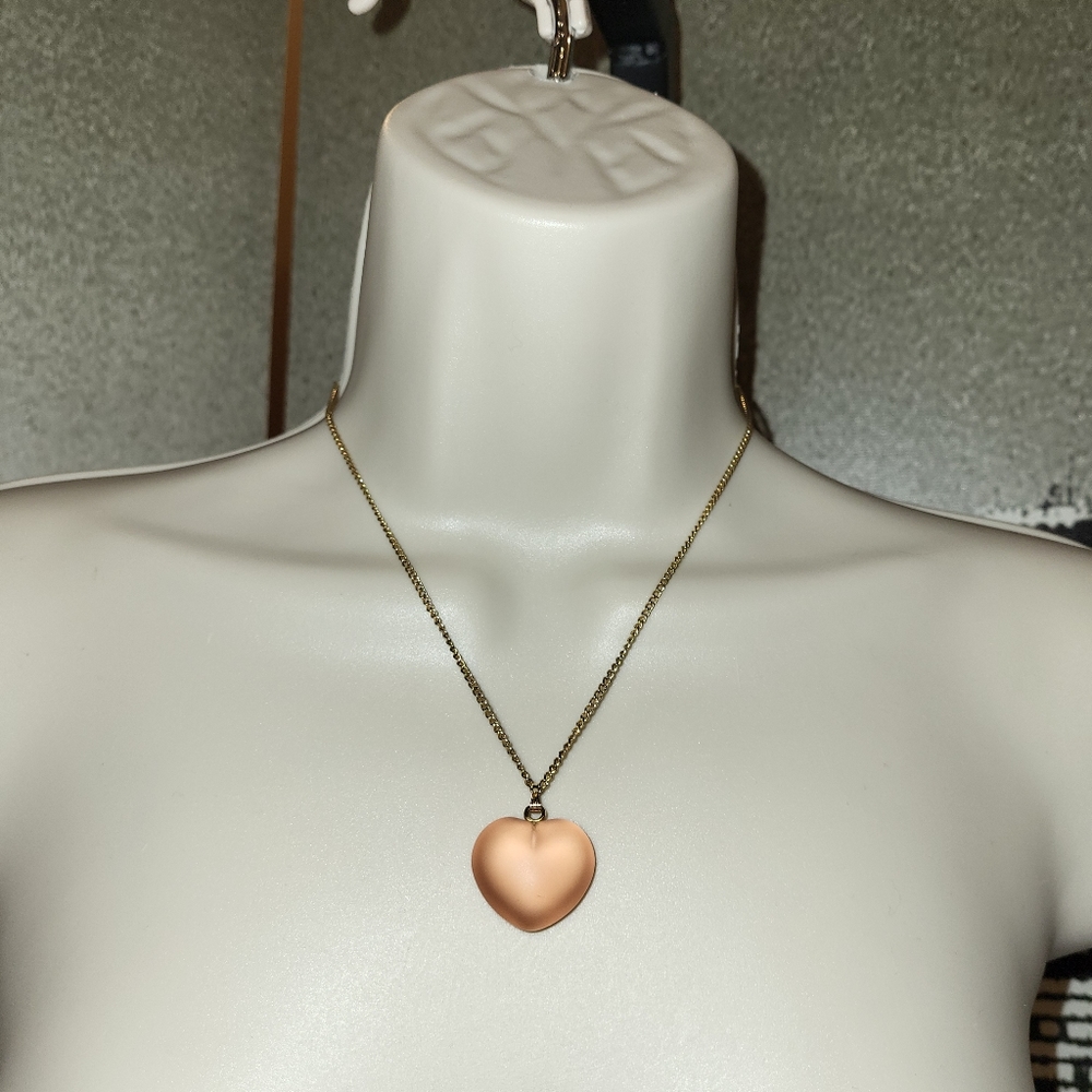 Vintage pink (looks like a coral pink) opaque Dimensional heart necklace